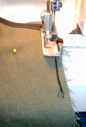 Tuck the Thread Tail into Line of Stitching at Serger