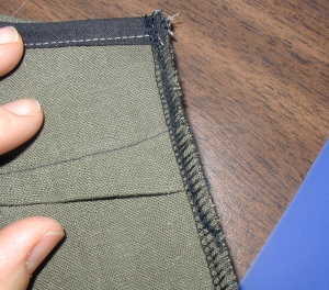 Side Seam, Inside Garment, at Underarm Point