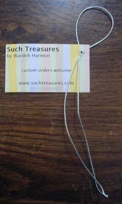 Ribbon Through Business Cards