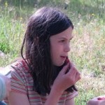 Naomi tries a choke cherry.