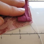 Fold bias tape up, straight up