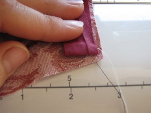 Fold bias tape up, straight up