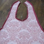 Bias tape added to entire outer edge of apron (right side)