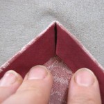 Press sides in on top of corner point