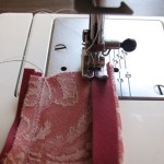 Stitch bias tape to wrong side of entire apron