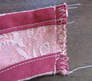 Stitch right sides of neck edges together, zig-zag or serge raw edges
