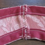 Stitch down raw edge - wrong side
