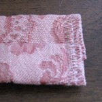Zig zag remaining raw edge of each tie