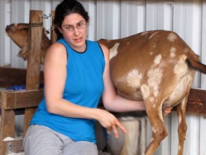 She's saying she's done... see her head twisting? I'm having to hold her body up while milking.